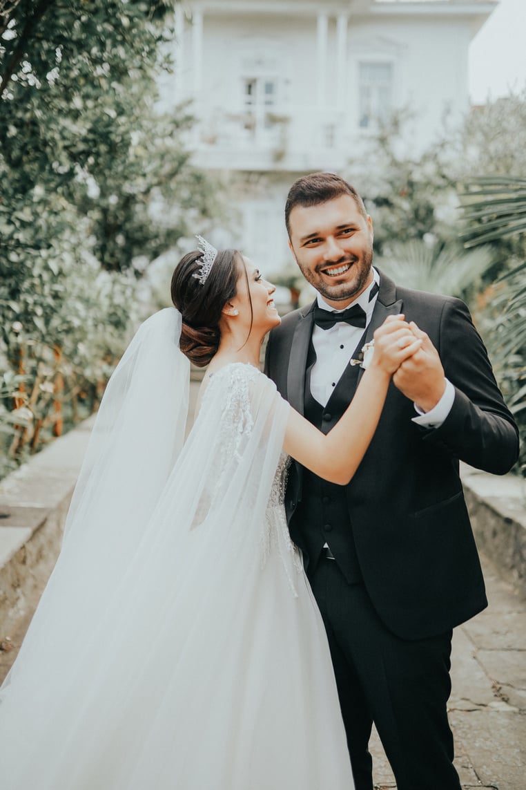 Bride and Groom Dancing Outdoors